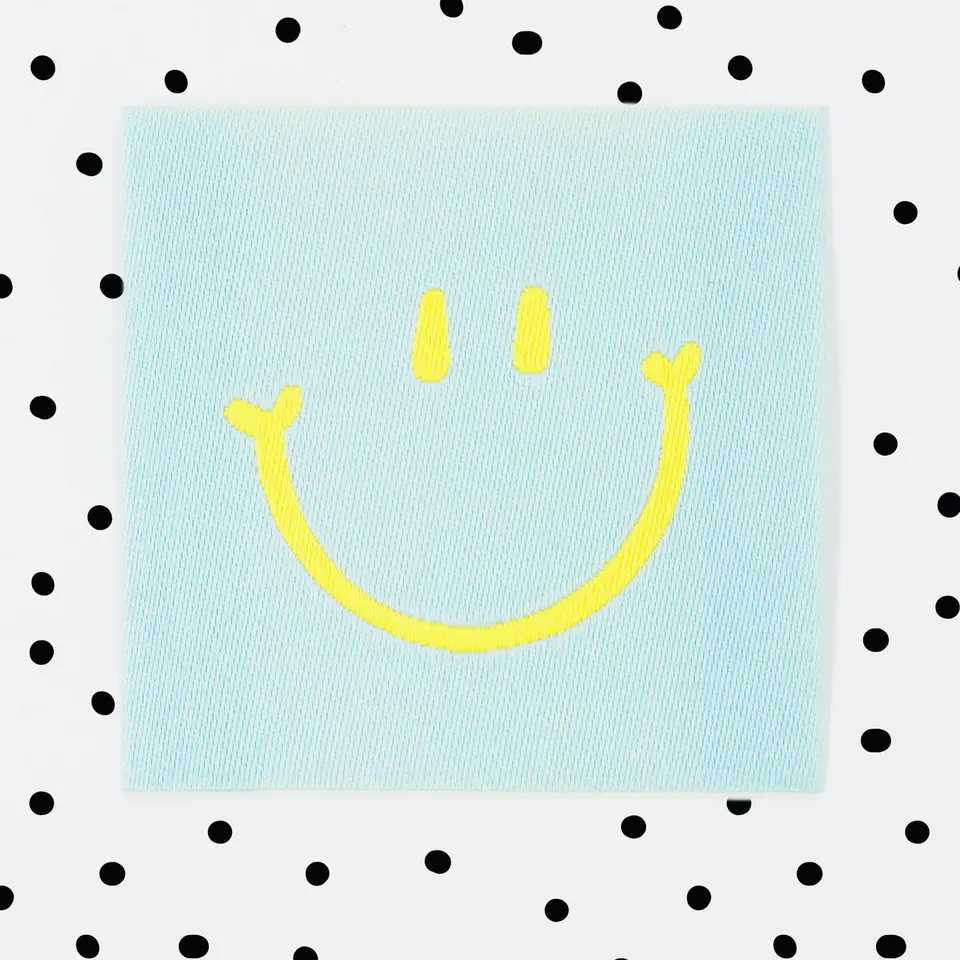 paul-clara-blue-smile-weblabel-4-x-4-cm image 1
