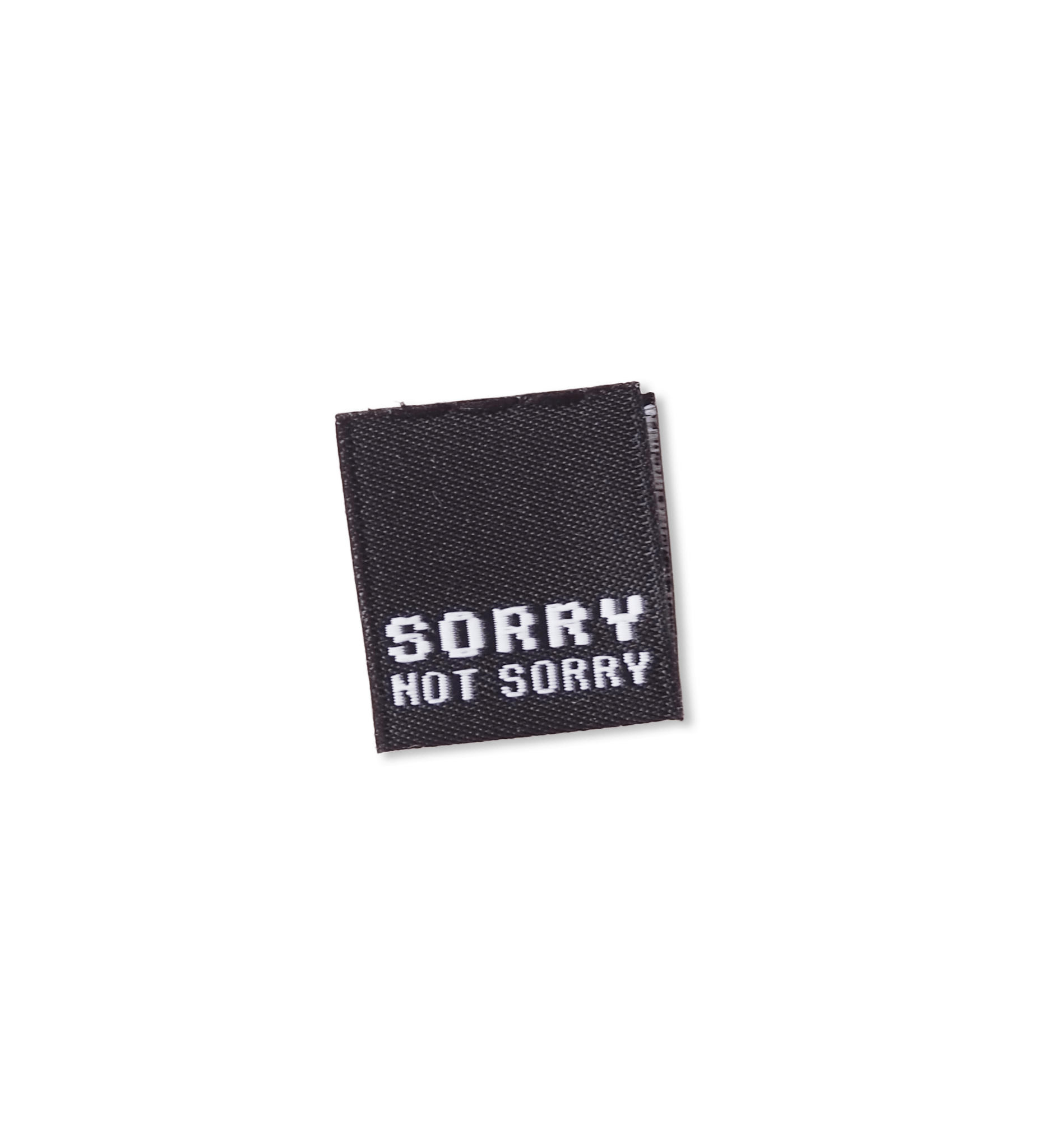 paul-clara-weblabels-sorry-not-sorry-mini-klapp-label-einn-hen image 1
