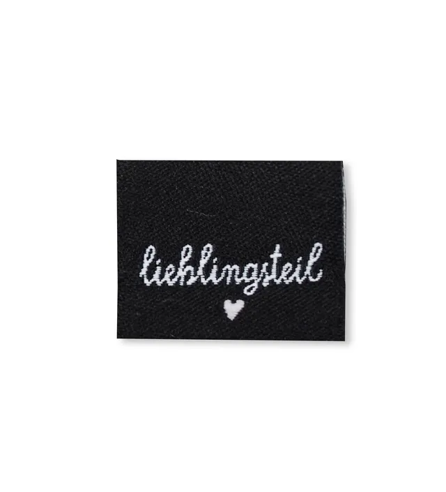 paul-clara-weblabels-lieblingsteil-schwarz-klapp-label-kotex image 1