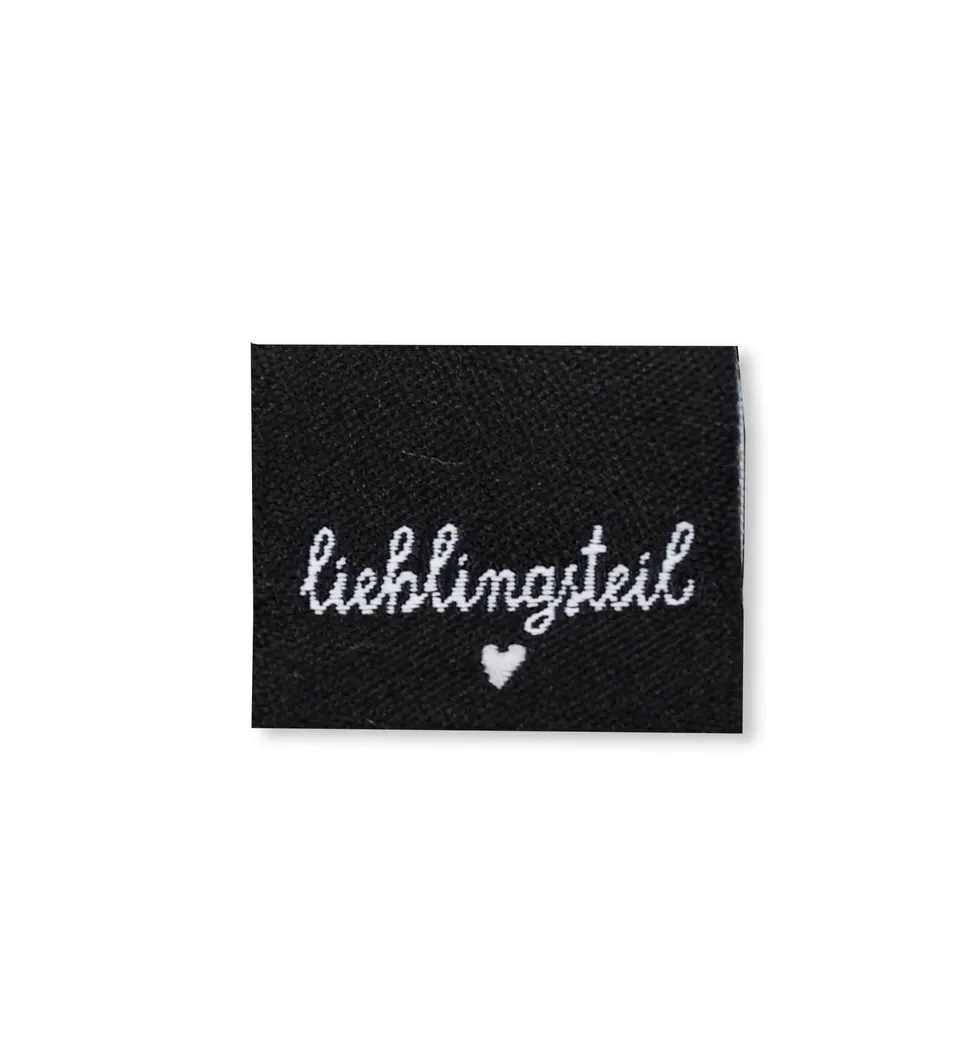 paul-clara-weblabels-lieblingsteil-schwarz-klapp-label-kotex image 1