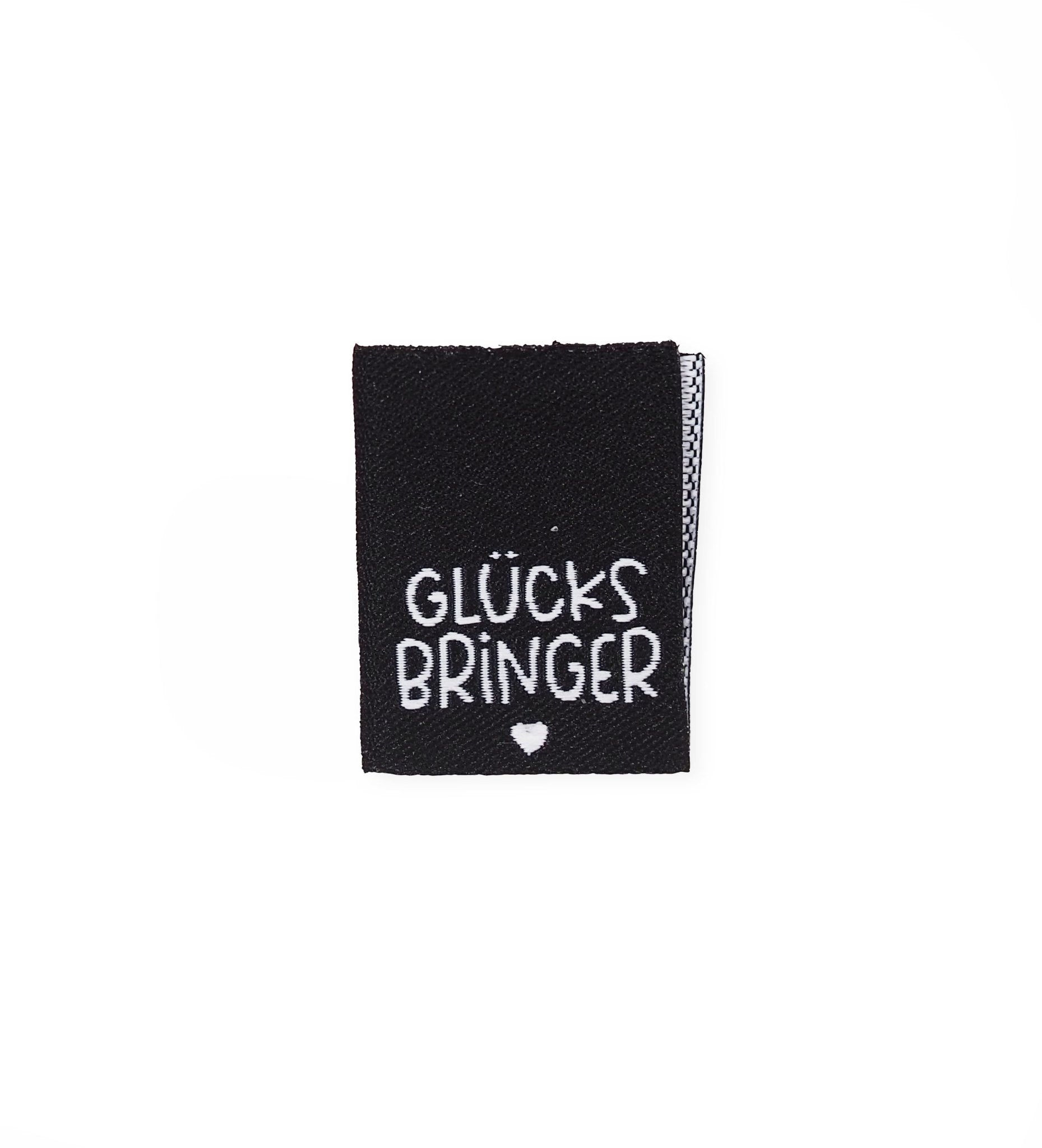 paul-clara-weblabels-gl-cksbringer-klapp-weblabel-kotex image 1