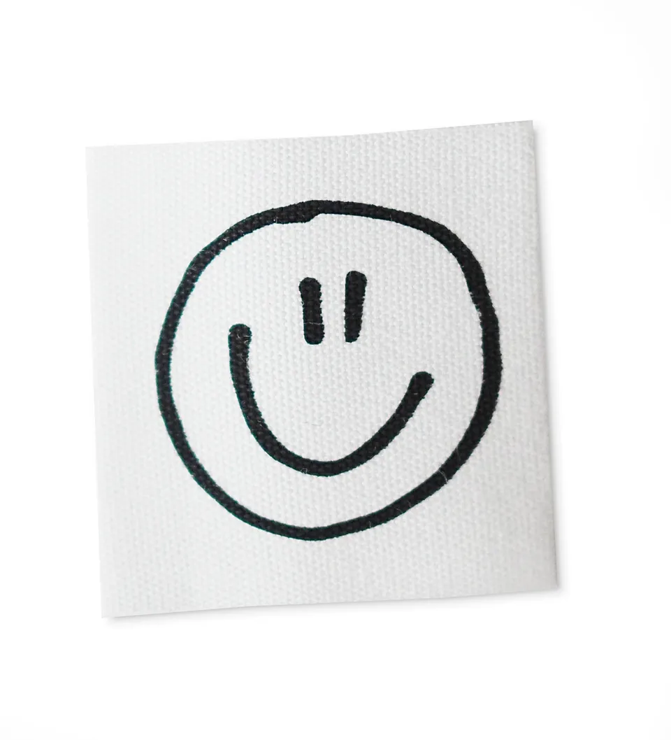 paul-clara-smile-baumwolllabel-zum-ann-hen-3-5-x-3-5-cm image 1