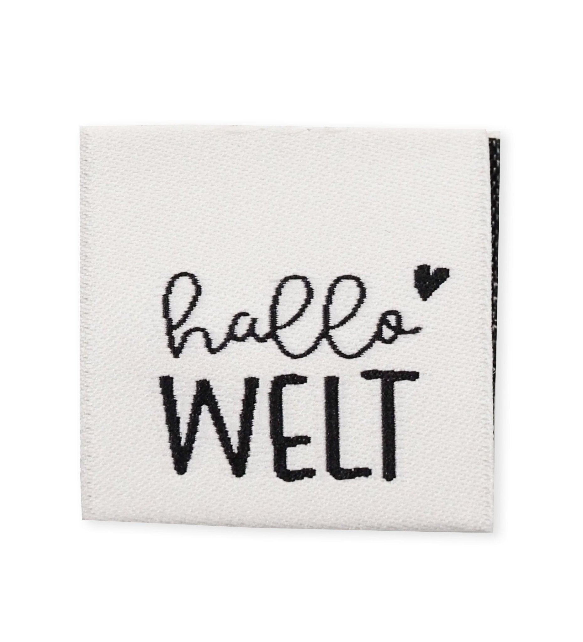 paul-clara-weblabel-hallo-welt-wei-klapp-label image 1