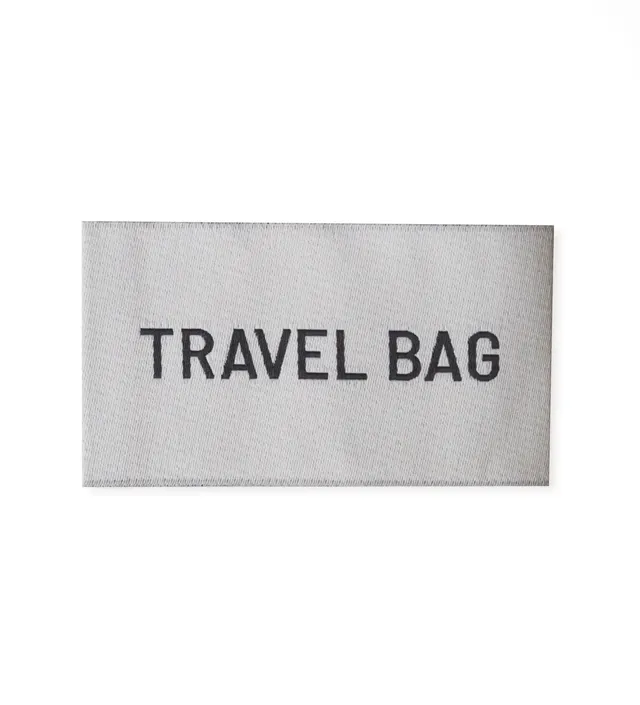 paul-clara-weblabels-travel-bag-weblabel-3-5x6-cm image 1