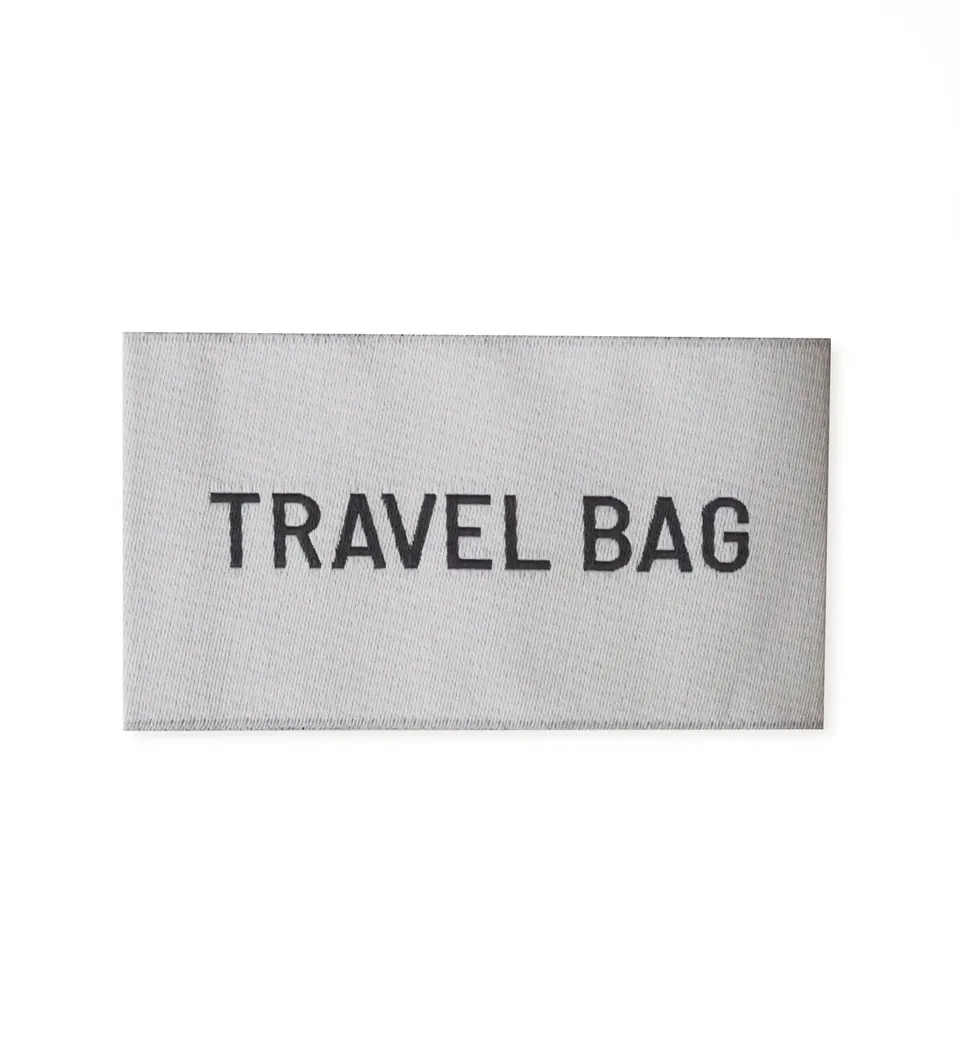 paul-clara-weblabels-travel-bag-weblabel-3-5x6-cm image 1