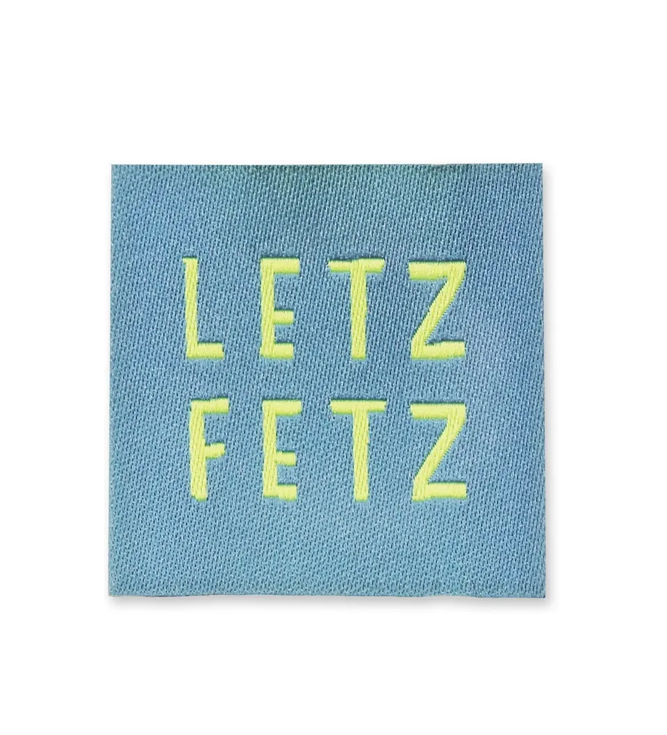 paul-clara-weblabels-weblabel-letz-fetz-blau-neon-gewebt image 1