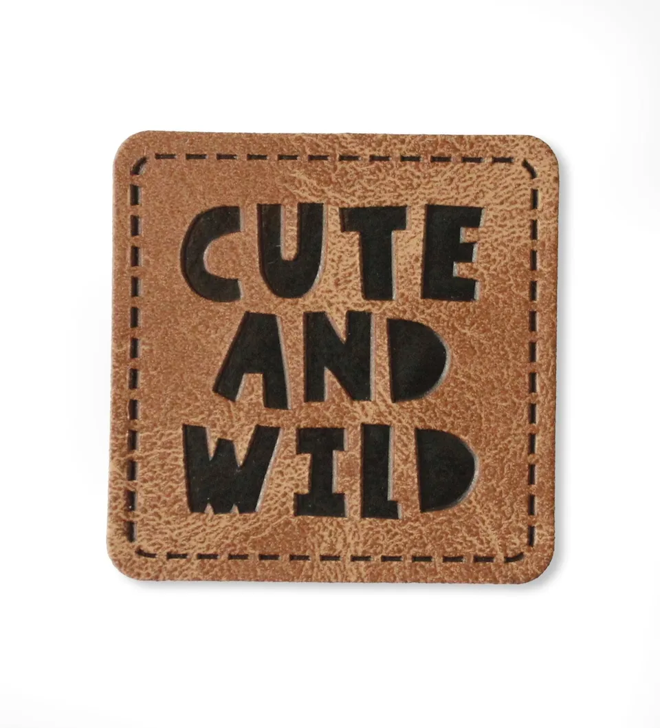 paul-clara-kunstlederlabels-cute-and-wild-label-iron-on-3-5x3-5-cm image 1