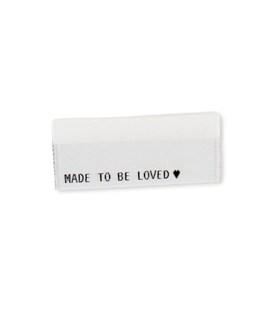 paul-clara-made-to-be-loved-klapp-weblabel-schwarz image 1