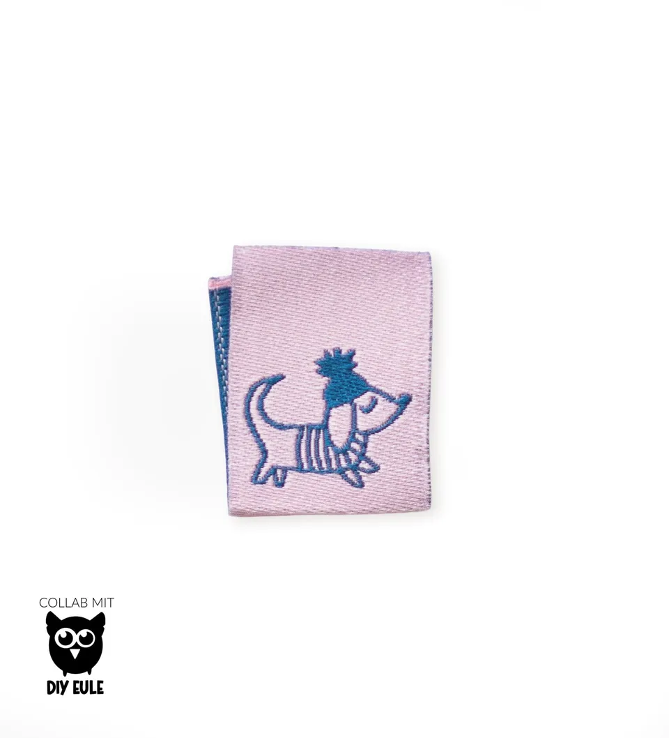 paul-clara-dackel-klapp-weblabel-rosa-blau image 1