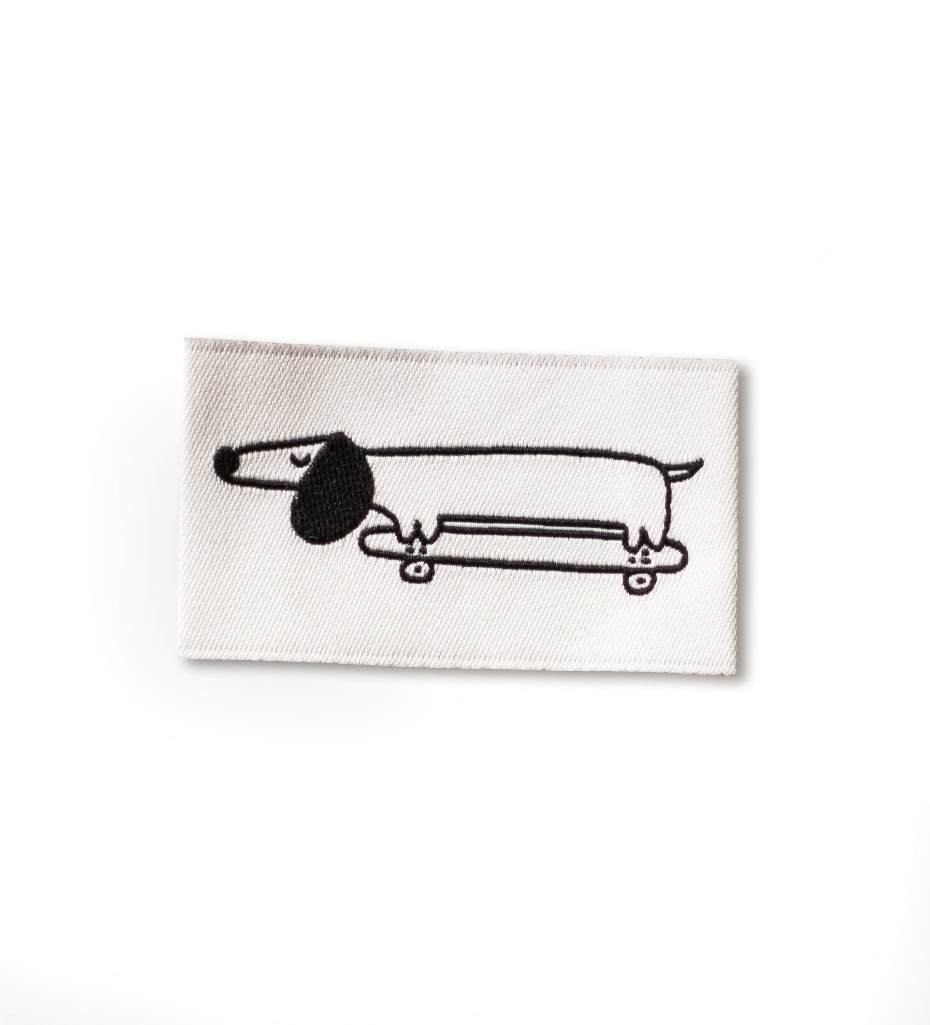 paul-clara-weblabels-dackel-skateboard-weblabel-3-5-cm image 1