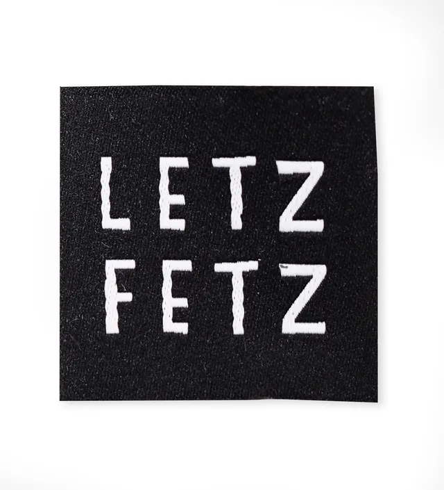 paul-clara-weblabels-letz-fetz-schwarz-weblabel-gewebt image 1