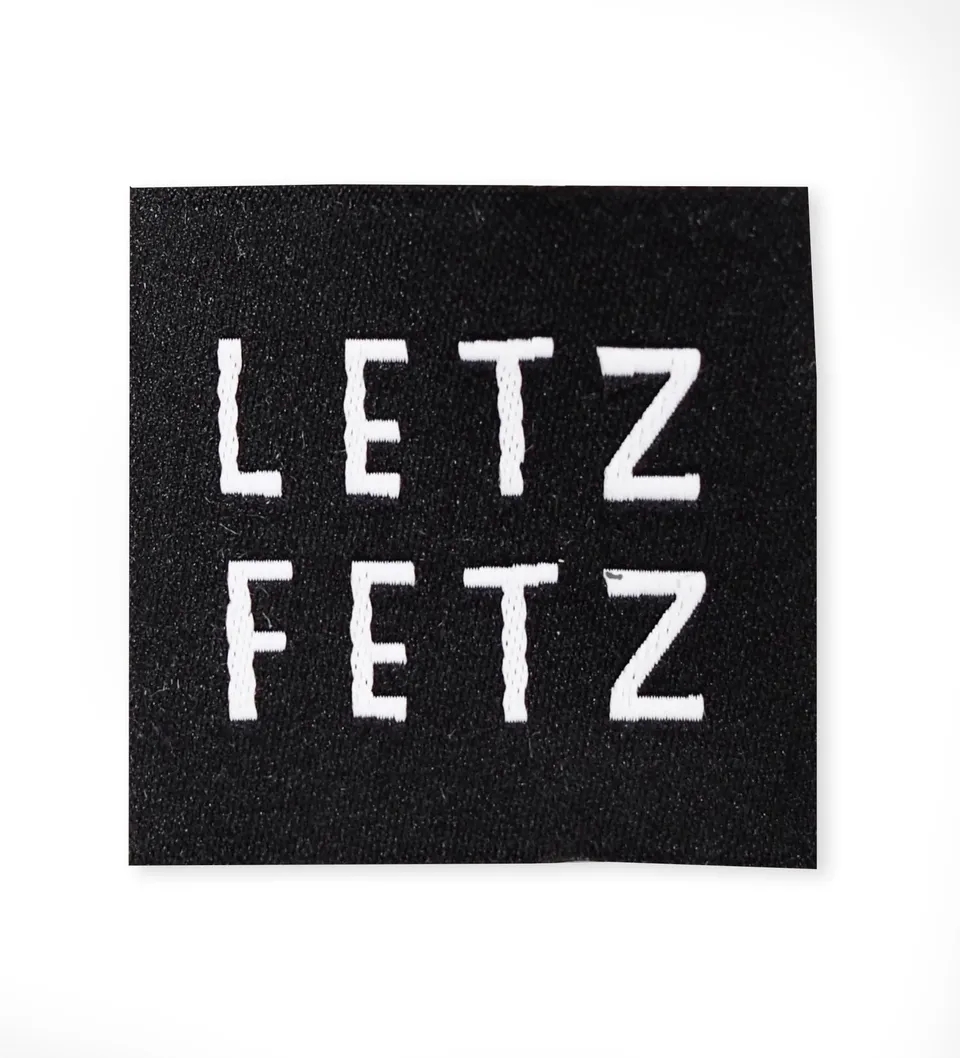 paul-clara-weblabels-letz-fetz-schwarz-weblabel-gewebt image 1