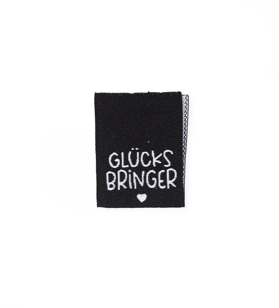 paul-clara-weblabels-gl-cksbringer-klapp-weblabel-kotex image 1