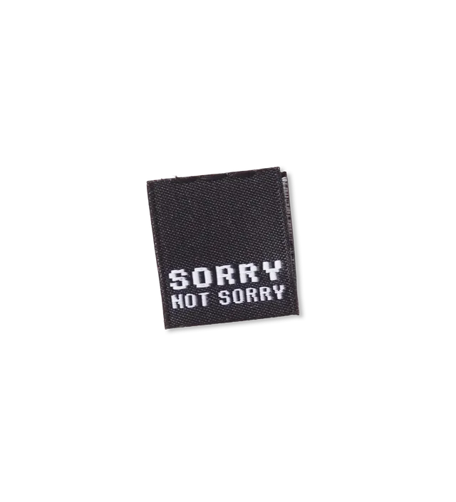 paul-clara-weblabels-sorry-not-sorry-mini-klapp-label-einn-hen image 1