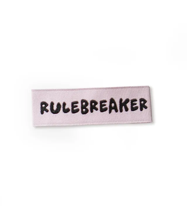 paul-clara-weblabel-rulebreaker-1-2x4cm-typo image 1