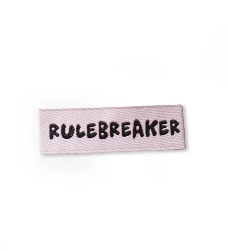 paul-clara-weblabel-rulebreaker-1-2x4cm-typo image 1