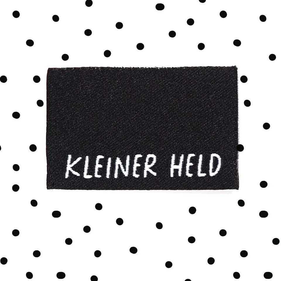 paul-clara-weblabels-kleiner-held-klapp-weblabel image 1