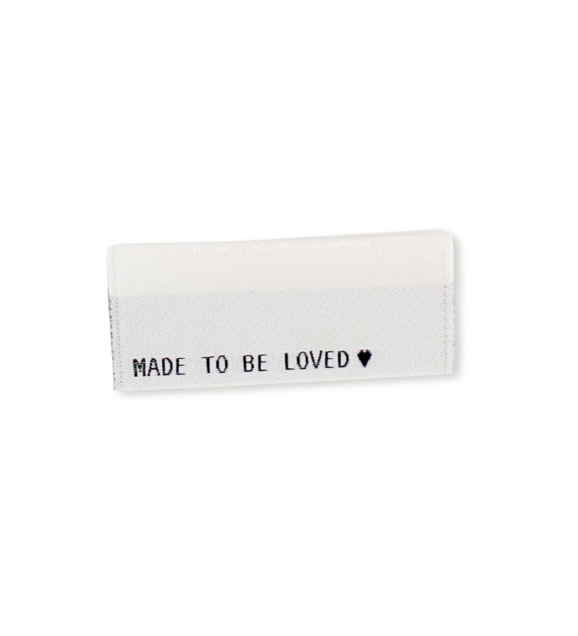 paul-clara-made-to-be-loved-klapp-weblabel-schwarz image 1