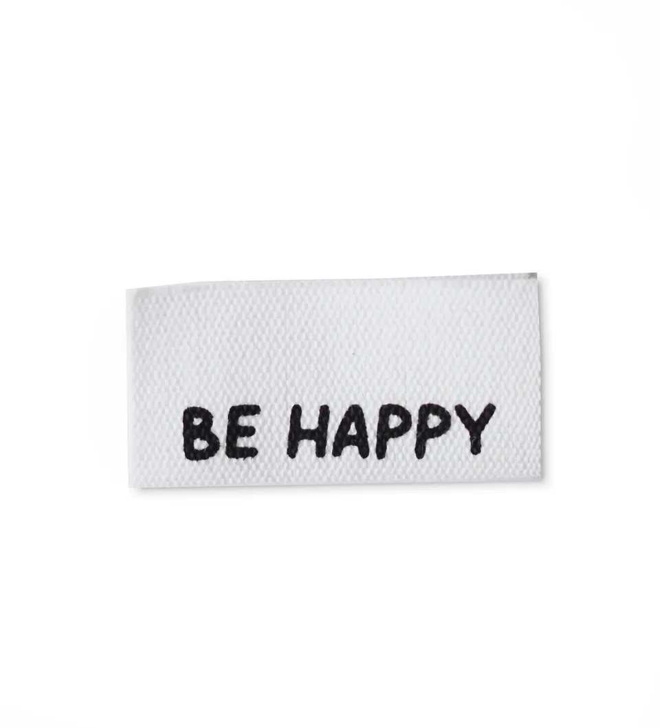 paul-clara-baumwoll-labels-be-happy-klapplabel-1-5x3-cm image 1