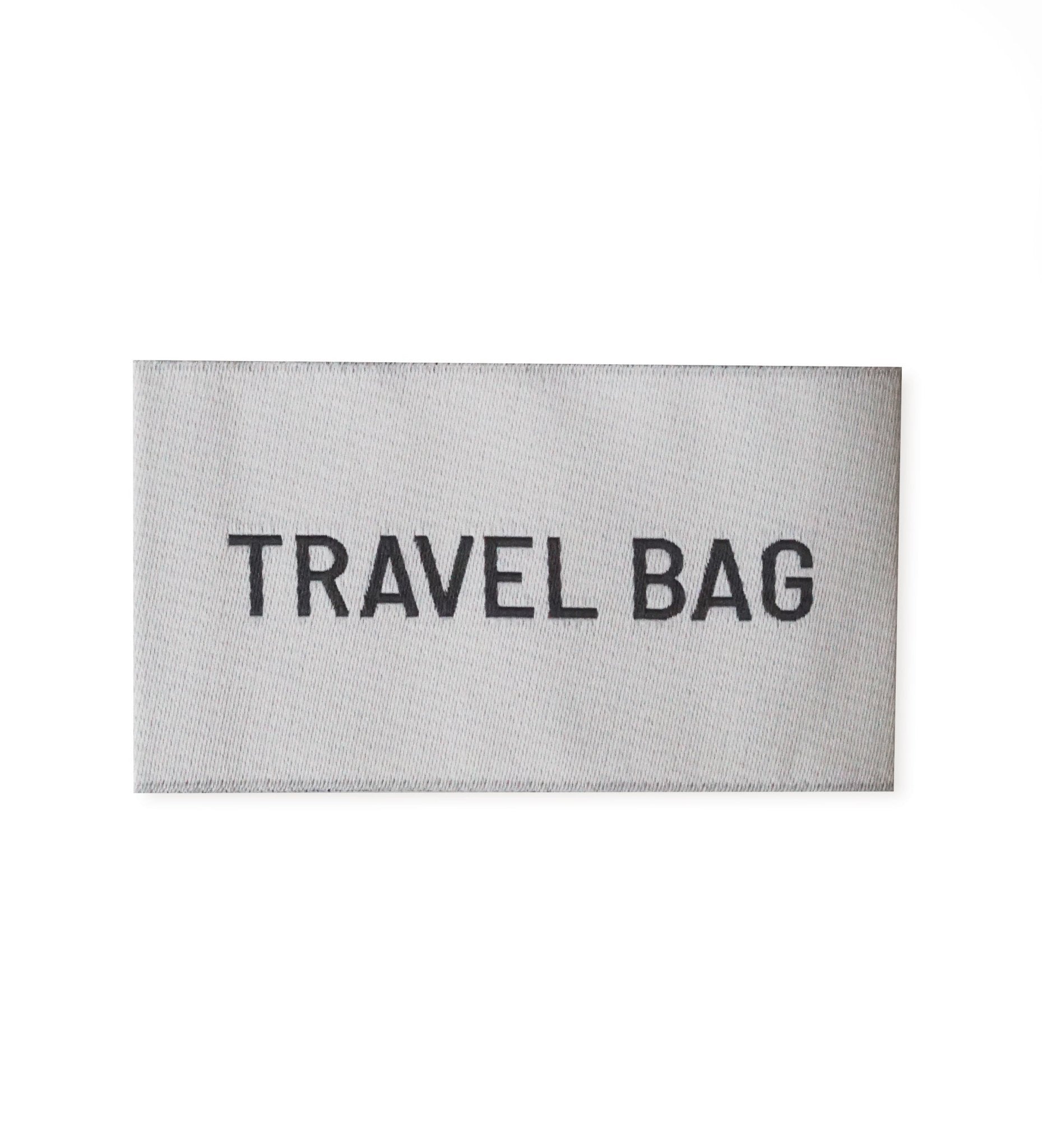 paul-clara-weblabels-travel-bag-weblabel-3-5x6-cm image 1
