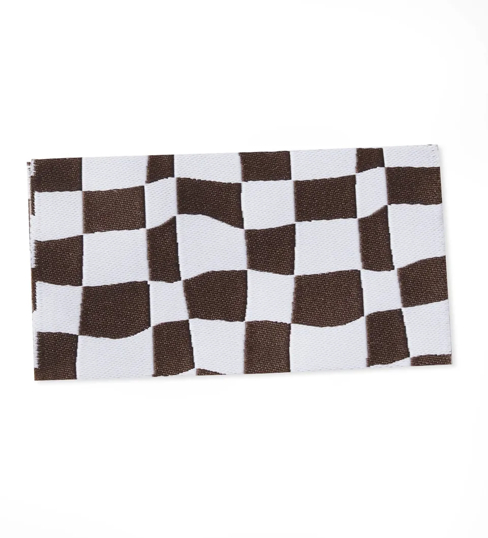 paul-clara-weblabels-klapp-weblabel-swinging-grid-braun-zum-einn-hen image 1
