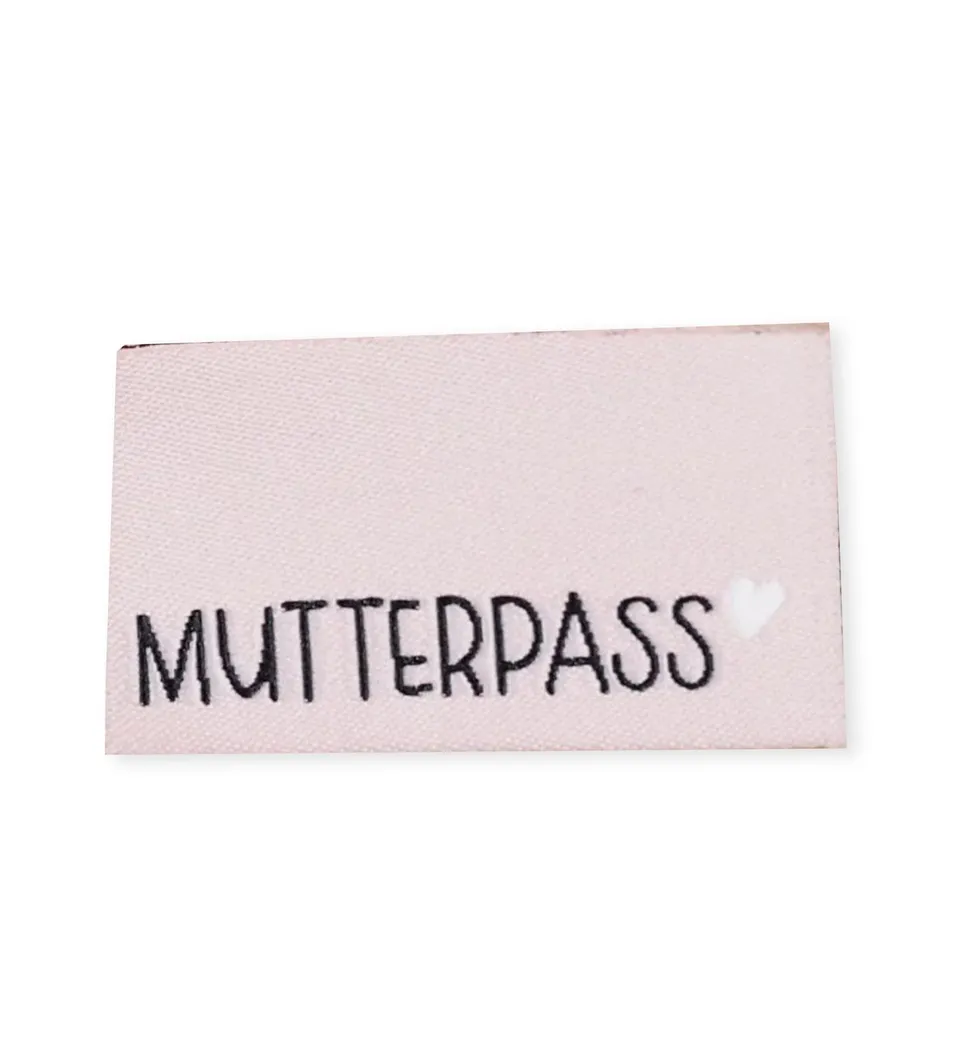 paul-clara-weblabels-mutterpass-klapp-label-rosa-kotex image 1