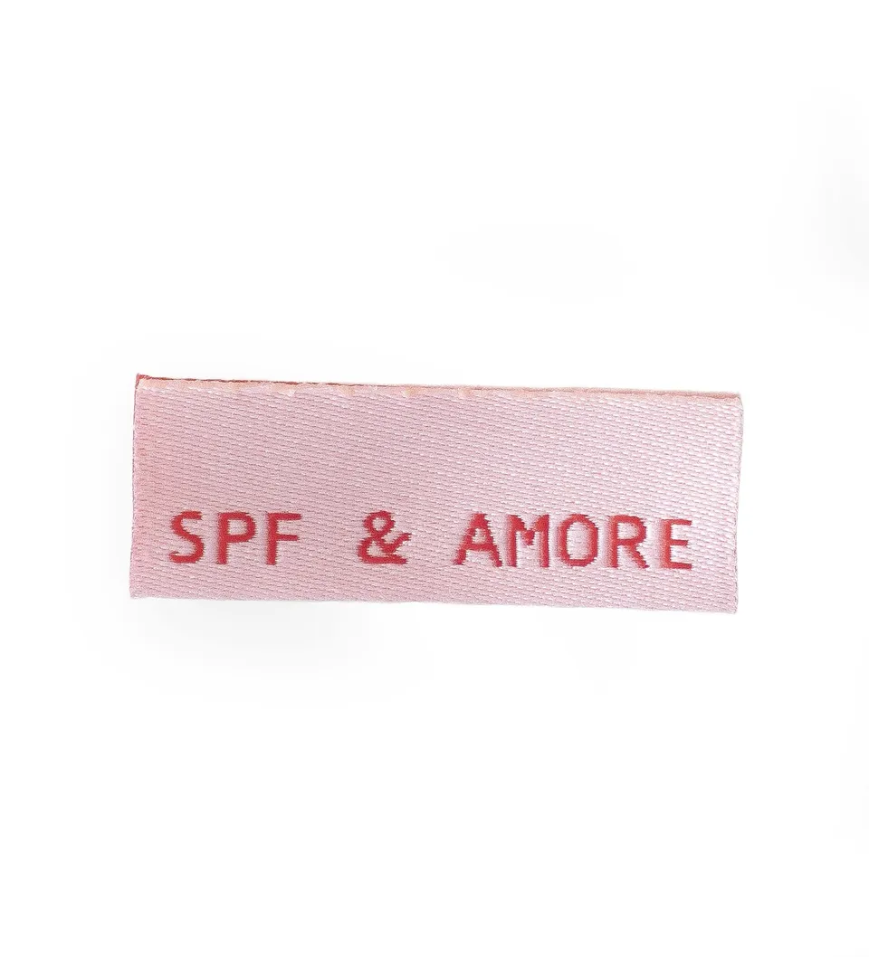 paul-clara-weblabels-spf-amore-klapp-label-schwarz image 1
