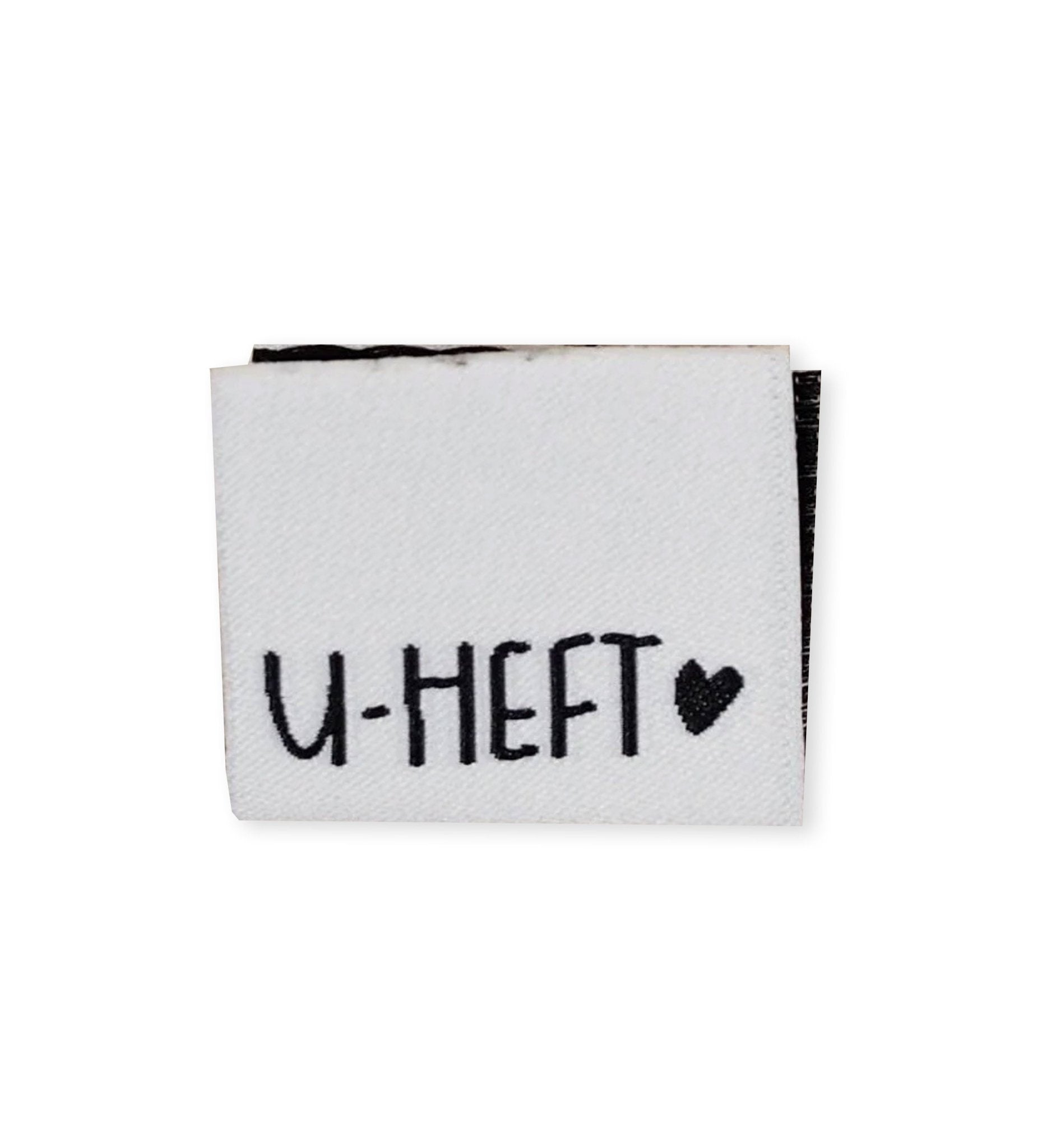 paul-clara-weblabels-u-heft-wei-klapp-label image 1