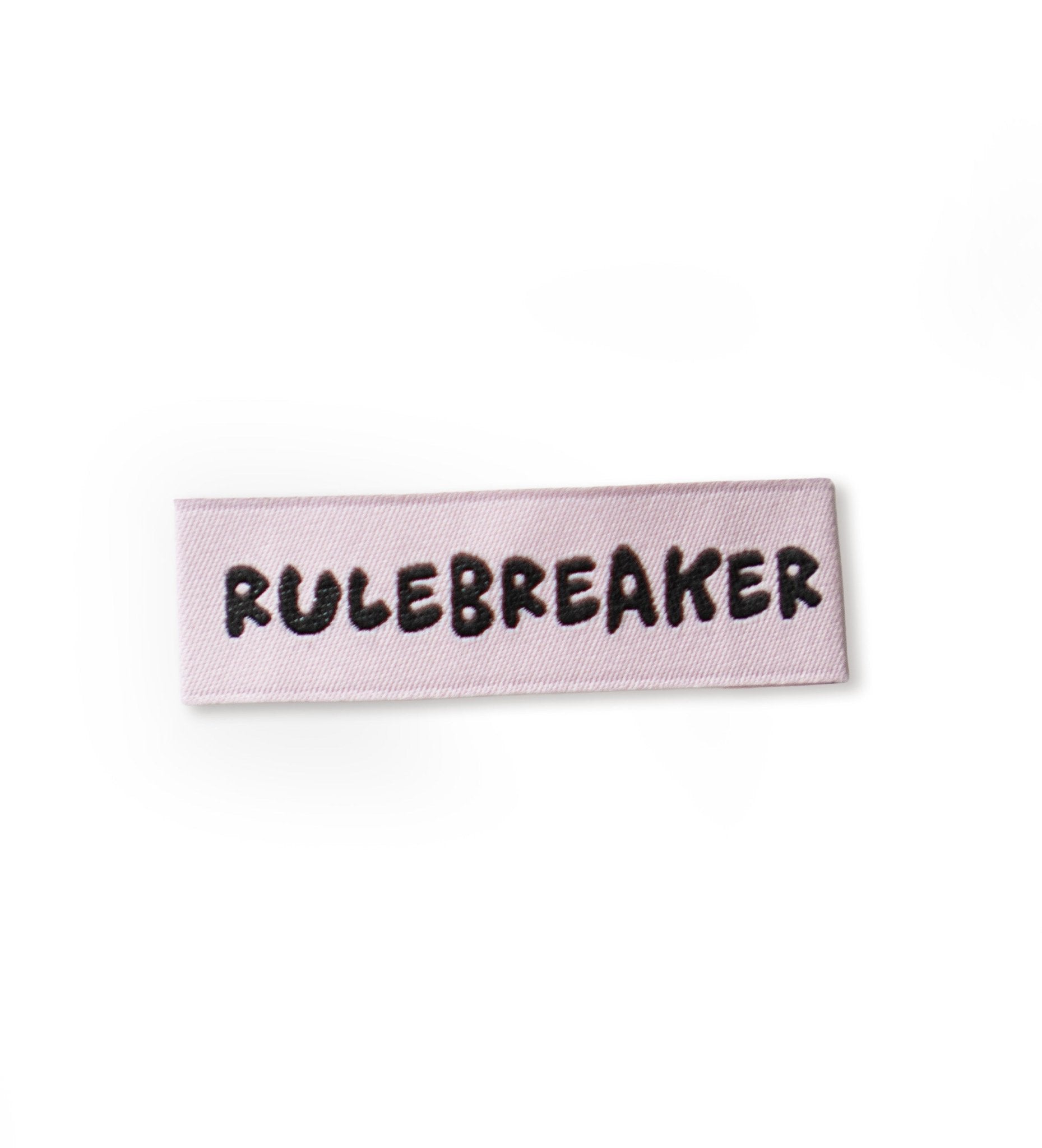 paul-clara-weblabel-rulebreaker-1-2x4cm-typo image 1
