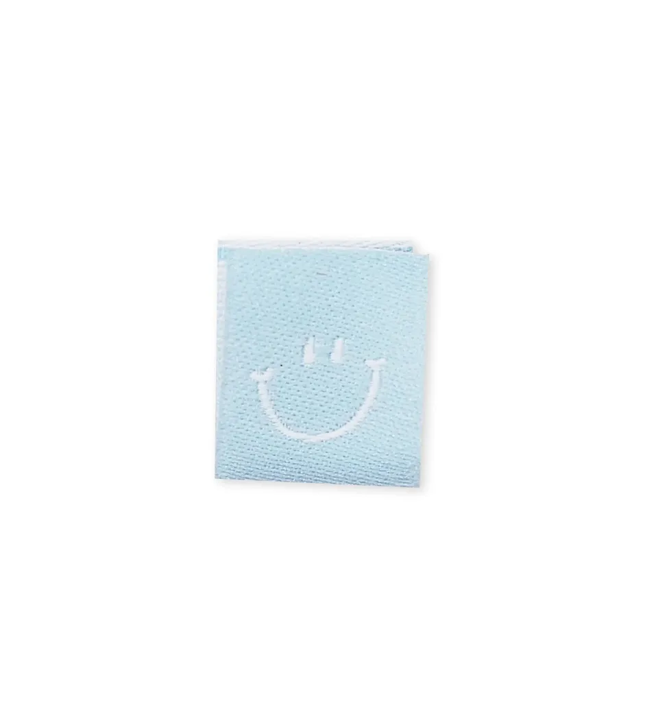 paul-clara-weblabels-klapp-weblabel-smile-hellblau-etikett image 1